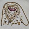 Image 1 : Vintage Costume Jewelry Lot features a Mix of Gold-Toned Chains, Necklaces, and Accessories