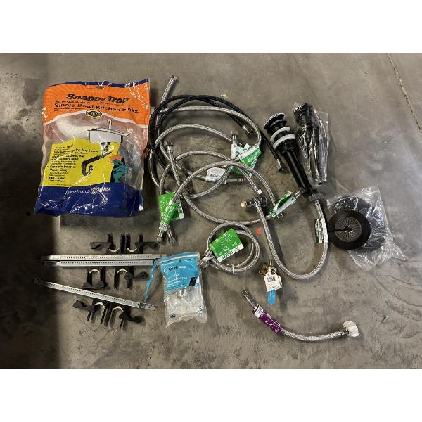 Lot of Plumbing Materials including Supply Lines, Drains, Grommets, Etc