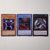 Image 1 : Three Assorted Holo RARE Yu-Gi-Oh Trading Cards Ft. 1ST EDITION Monarch!