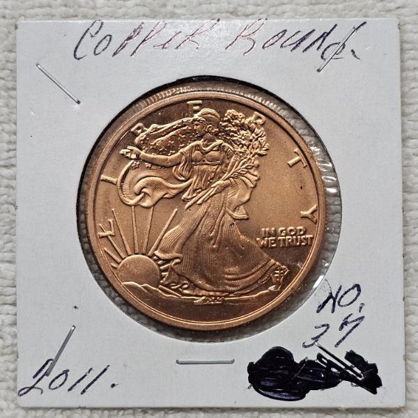 1 troy ounce .999 Fine Copper Round featuring the "Walking Liberty" Design