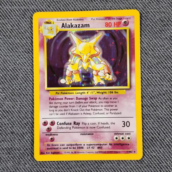 Alakazam 1/102 Holo Rare Vintage Base Set Pokemon Trading Card in Near Mint Condition!