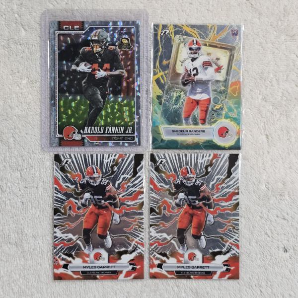 Four Cleveland Browns Football Cards inc. Harold Fannin Jr., Shedeur Sanders, And Myles Garrett
