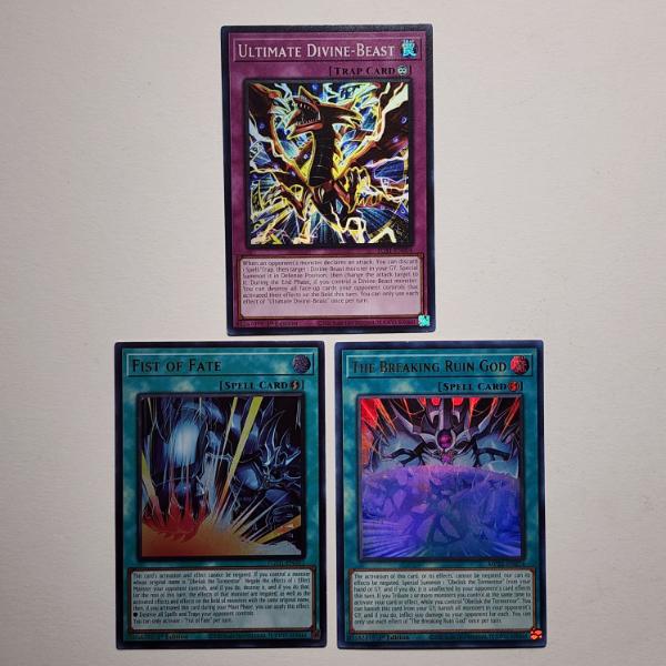 Three Assorted Holo Rare Yu-Gi-Oh Trading Cards