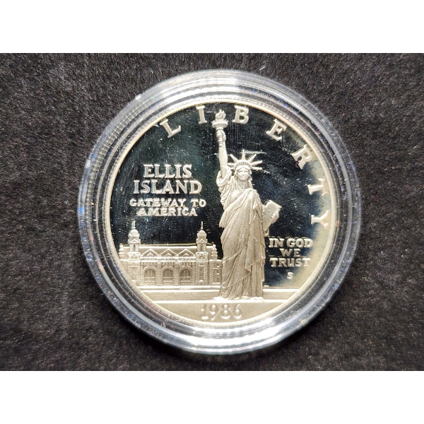 1986-S Ellis Island Silver Dollar in Protective Capsule - 90% Silver