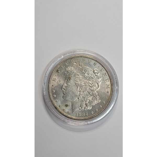 United States 1884-P Morgan 90% Silver Dollar In Coin Capsule