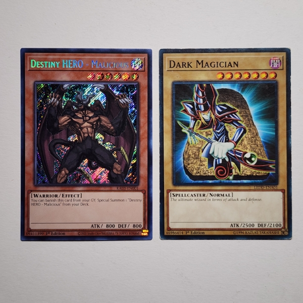 Two Assorted Yu-Gi-Oh Trading Cards ~ Holo Destiny Hero Malicious & Dark Magician 