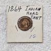 Image 1 : United States 1864 Indian Head Cent packaged in a standard 2x2 cardboard coin flip FV $.01