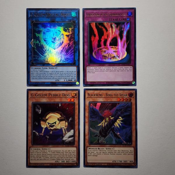 Four Assorted Holo Yu-Gi-Oh Trading Cards 