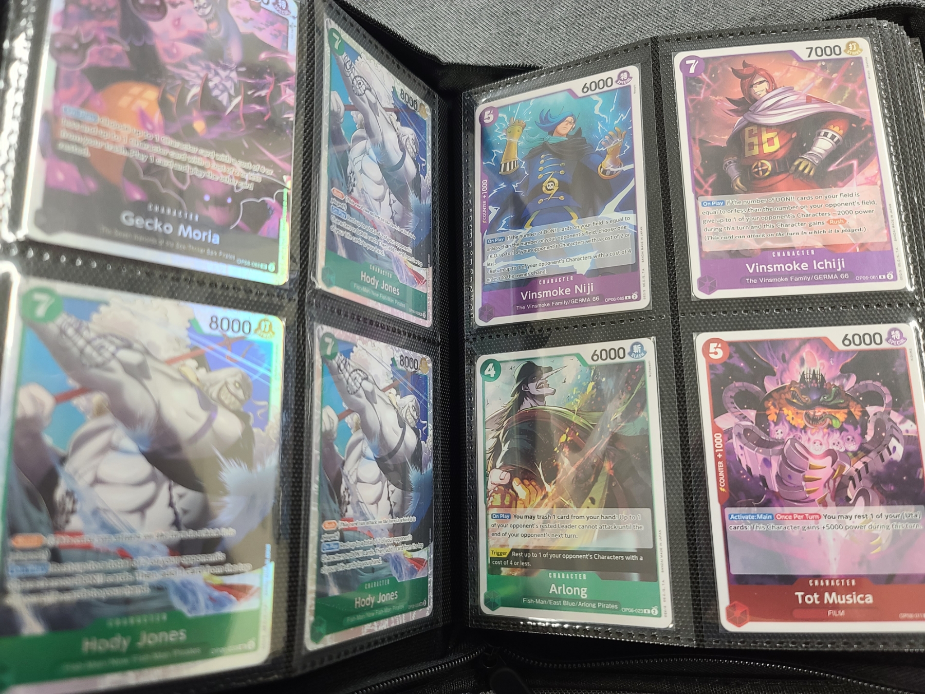 Binder Loaded With Assorted One Piece Trading Cards - 4 Card Per Page Binder - Holds Over 150 Cards - Bosley Auctioneers Binder Loaded With Assorted One Piece Trading Cards - 4 Card Per Page Binder - Holds Over 150 Cards - Bosley Auctioneers