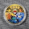 Image 1 : Commemorative Pokemon Coin Featuring Starters Charmander, Bulbasaur & Squirtle 