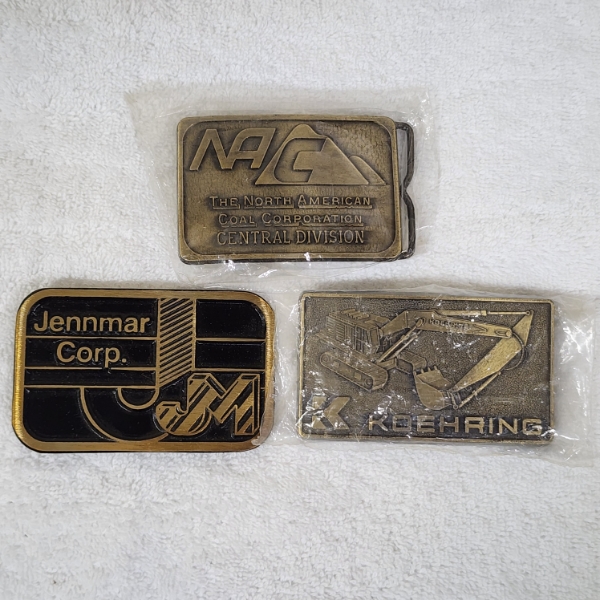 Three Assorted Vintage Collectible Belt Buckles Ft. Jennmar Corp, Koehring & North American Coal Cor