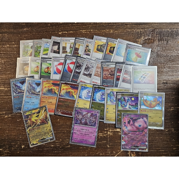 Assorted Foreign Pokemon Trading Cards Featuring Holo, Reverse Holo's & Rares!