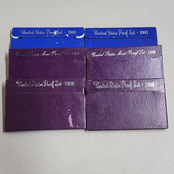 Six Assorted United States Mint Proof Sets: 1983, 1983, 1989, 1988, 1986, 1984