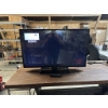Image 1 : LG 42" Television w/ Remote. Both television and remote are in working condition.