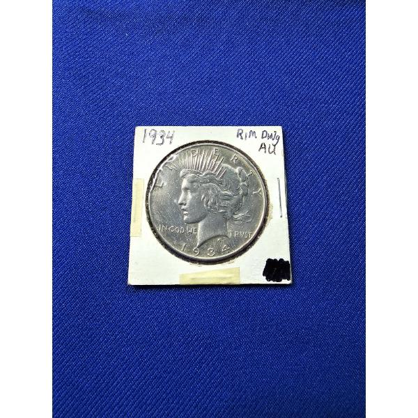 1934 Silver Peace Dollar - Rim Ding - Excellent Condition