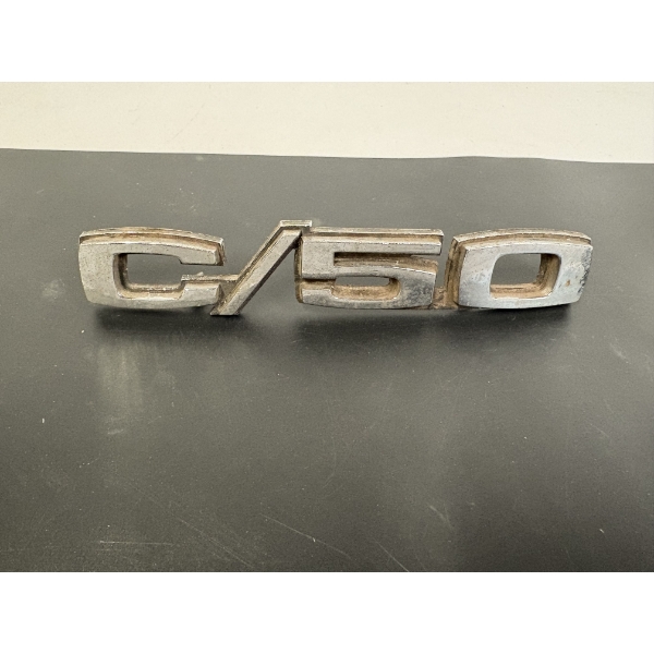 Chevrolet C/50 medium-duty truck fender emblem from the 1967-1972 era 