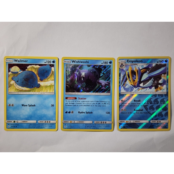 Three Assorted Pokemon Trading Cards Including Holo Rare Vintage Cards