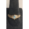 Image 1 : 10K Yellow Gold Women's Ring With Blue Topaz & Diamonds - Size 8 - Weight: 2.4g 