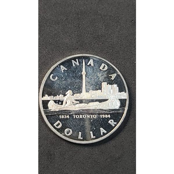 1984 Canadian 150th Anniversary (Sesquicentennial) Of Toronto 50% Silver Dollar - ASW: 0.375oz