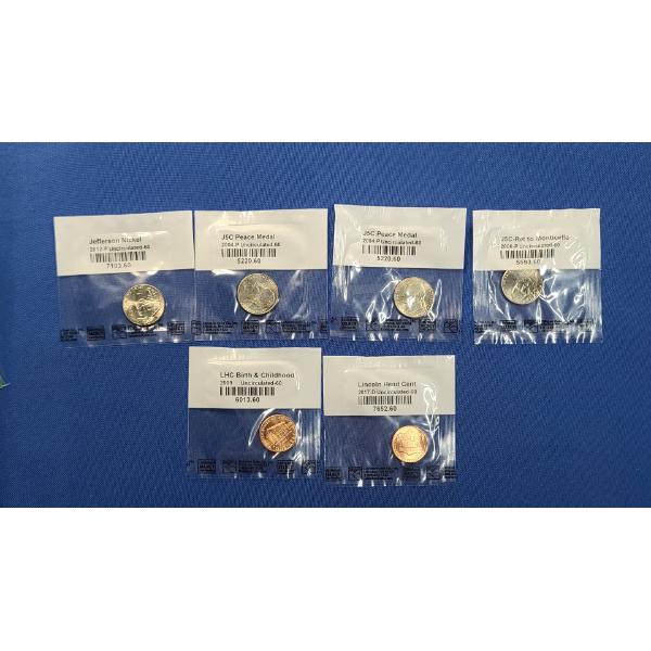 Assorted United States Uncirculated Nickels & Lincoln Head Cents In Sealed Littleton Bags -FV: $0.22