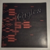 Image 1 : The Eagles 1976 "Hotel California" Tour Program - Original - 11" x 11" - Excellent Condition