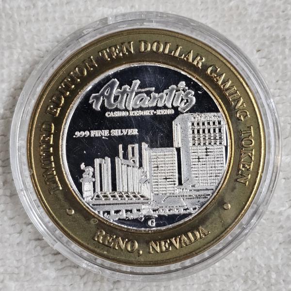 1999 Atlantis Casino $10 Bimetal .999 Fine Silver Gaming Token w/Brass Outer Ring - ASW .60 ozt.