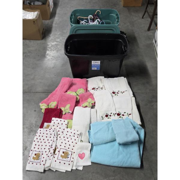 Two Storage Totes With Lids, Plastic Clothes Hangers & Like New Towels And Hand Towel Sets