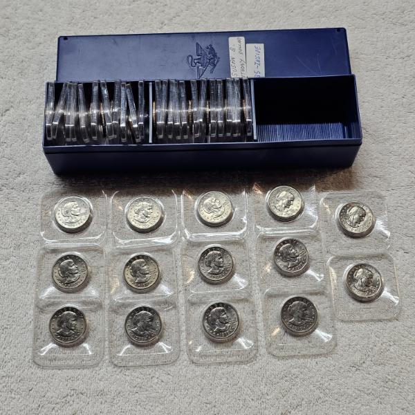 Susan B. Anthony Dollars in Protective Plastic Capsules within a Blue Storage Box FV: $38.00