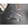 Image 2 : 4 Pocket Knives in Checkered Bag - One Includes Spoon/fork/corkscrew (back is broken)
