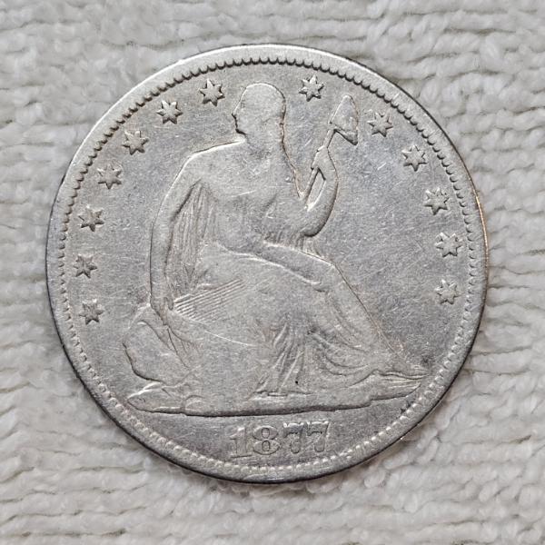 90% Silver U.S. 1877 Seated Liberty Coin FV: $.50