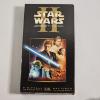 Image 3 : Two Star Wars VHS Tapes And Red Lightsaber Toy