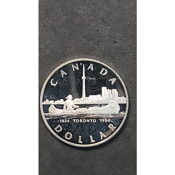 1984 Canadian 150th Anniversary (Sesquicentennial) Of Toronto 50% Silver Dollar - ASW: 0.375oz