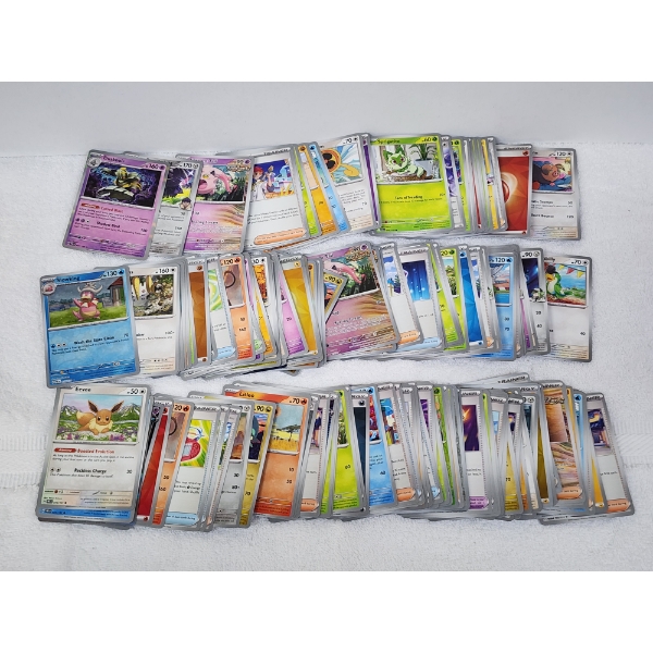 Large Collection of Assorted English Pokemon Trading Cards Including Holo & Reverse Holos!
