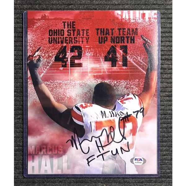 Autographed Mike Hall Jr 8"x10" Photo Showing His Love For The Team Up North .  JSA Authenticated.