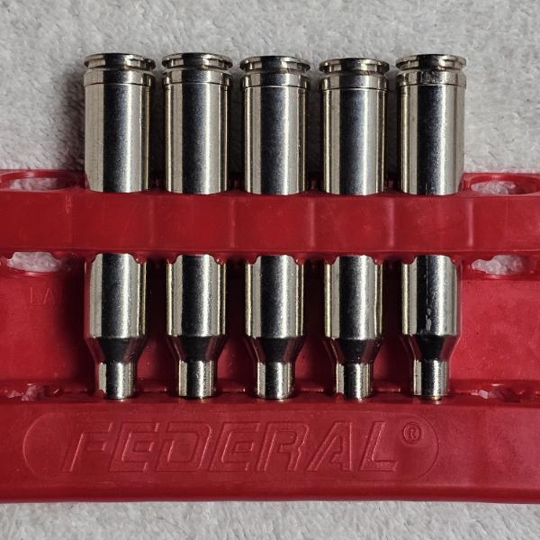 10 Federal Premium 7mm Remington Magnum Nickel-Plated Rifle Cartridges in a Red Plastic Carrier