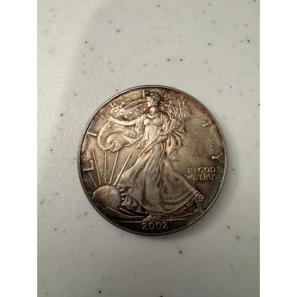 Rare Toned 2002 United States Silver Eagle - MS +