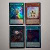 Image 1 : Four Assorted Holo Yu-Gi-Oh Trading Cards 