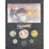 Image 1 : Assorted US Coins, Small Tube of Gold Flake, and Token