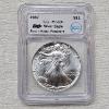 Image 1 : Austin Hutto Signed 1987 American 99.9% Silver Eagle Coin Graded as MS69+ by the ICG
