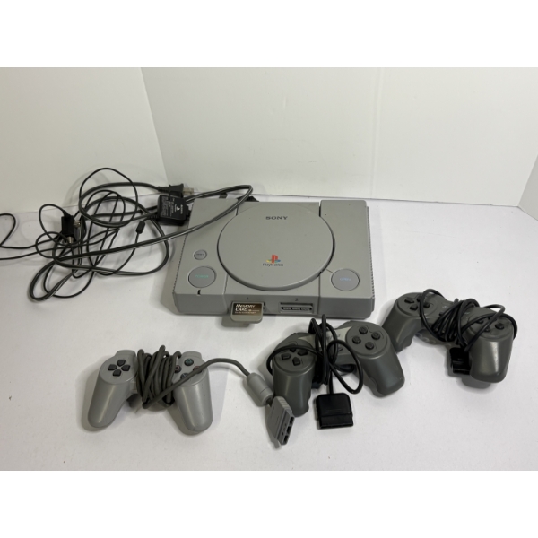 Sony PlayStation with 3 Controllers & Cords/Memory Card - Powers On - Untested 