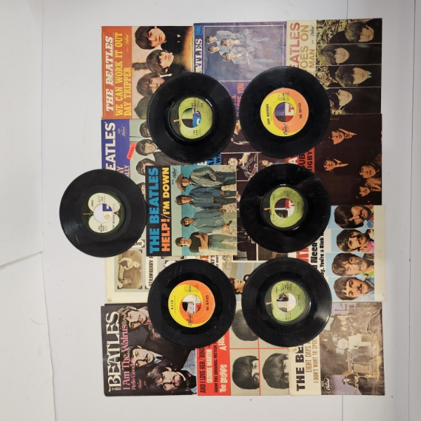 Collection of Vintage 7-inch 45 RPM Vinyl Records and Picture Sleeves released by The Beatles