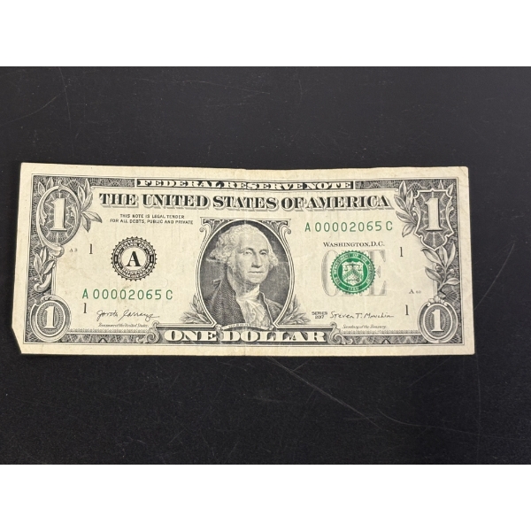 Low Serial Number $1.00 Bill - FV $1.00 - In Plastic Cover