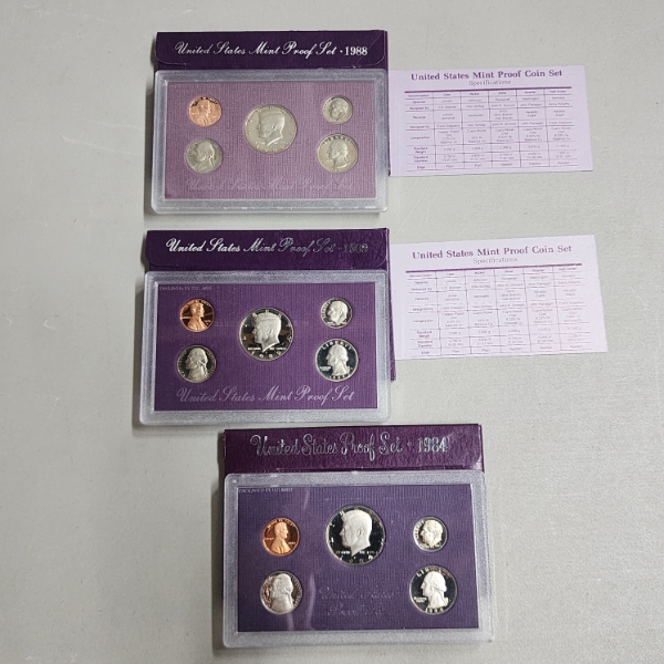 Three United States Mint Proof Sets: 1988, 1989, 1984