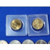 Image 6 : Assorted U.S. Coins: Sacagawea Dollars, Jennedy Half Dollars, Washington Quarters