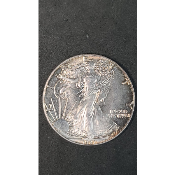 1987 1 Oz .999 Fine Silver American Eagle - Toned