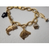 Image 4 : 14K Gold 7in Charm Bracelet with Various 14K Gold Charms TW: 14.0g