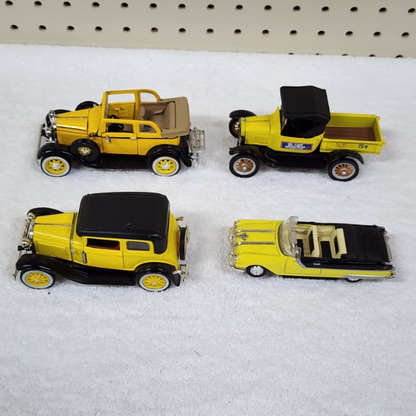 Four Assorted Collectible Die Cast Scale Replica Collectible Cars 