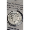 Image 2 : 1923-S Silver Peace Dollar in First Commemorative Mint Display With Stamp