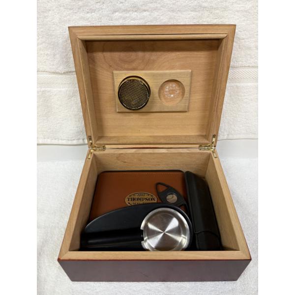 Thompson & Co. Model Cigar Humidor with a rich cherry wood finish and an internal hygrometer 