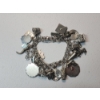 Image 1 : Gorgeous Sterling Silver Charm Bracelet with Assorted Charms - Total Weight: 90.2g